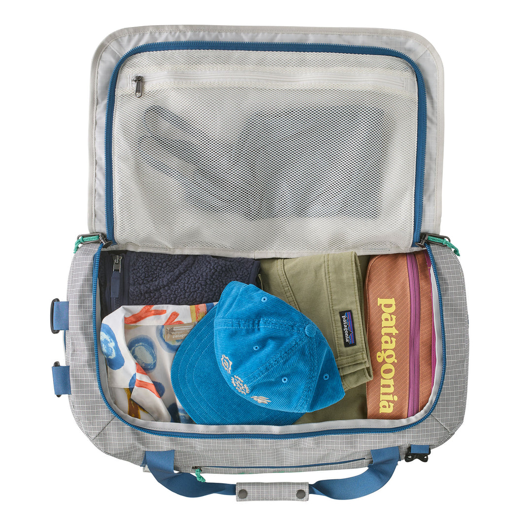 Patagonia - Black Hole Cube 6L - Peach Sherbet – Haven Surf